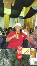 Aliyaah Arnolds showing off her bronze medal